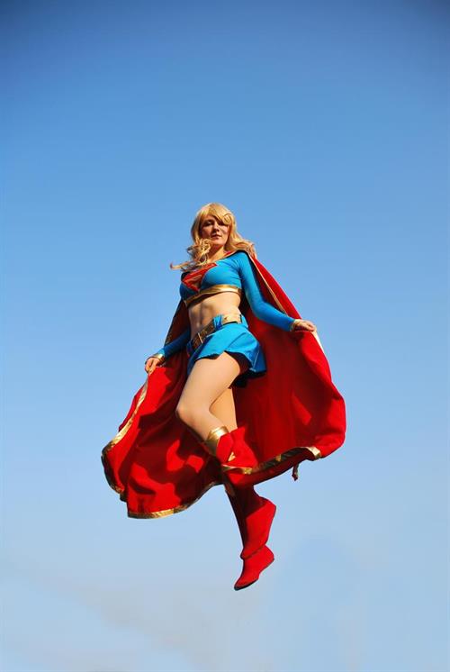 Girls dressed up as Supergirl