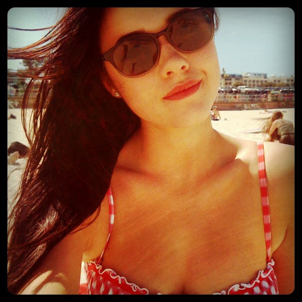Demi Harman in a bikini taking a selfie
