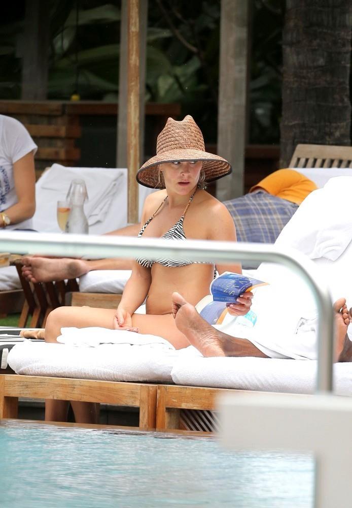 Brittany Daniel in a bikini