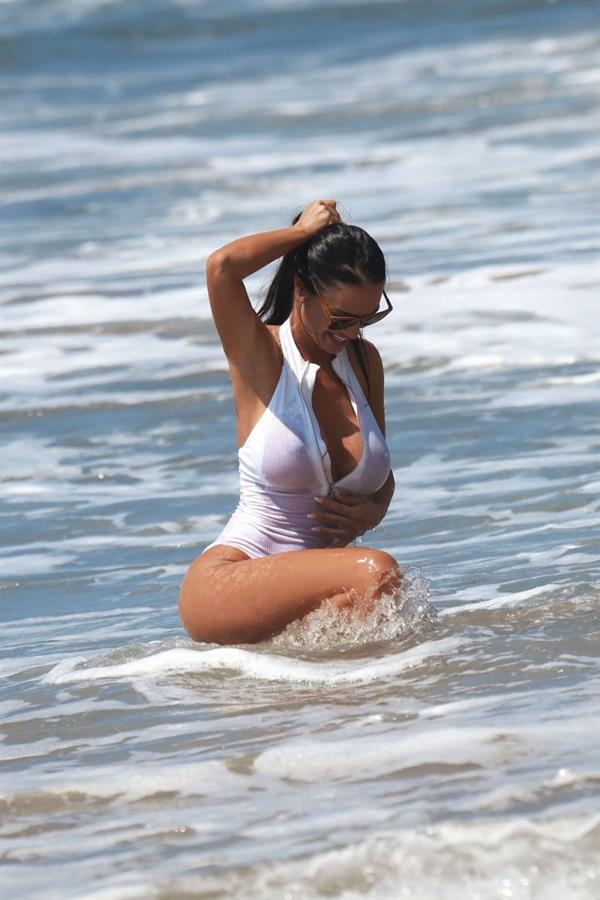 Charlie Riina in a beach photoshoot for 128 Water in Santa Monica on  11/25/2018