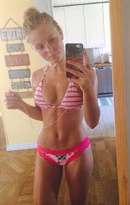 Zara Larsson in a bikini taking a selfie