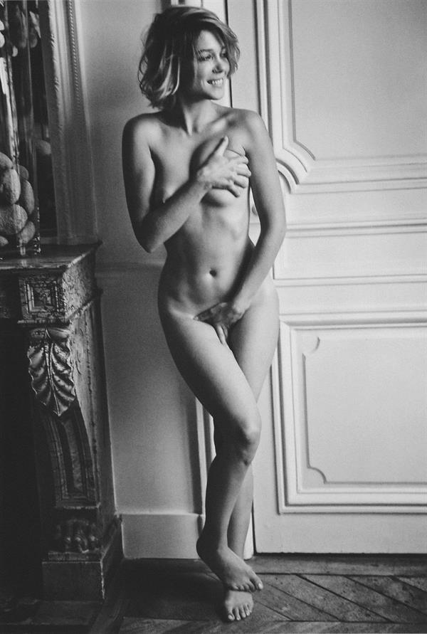 Lea Seydoux naked black and white photoshoot with her posing holding her topless big tits and nude pussy.