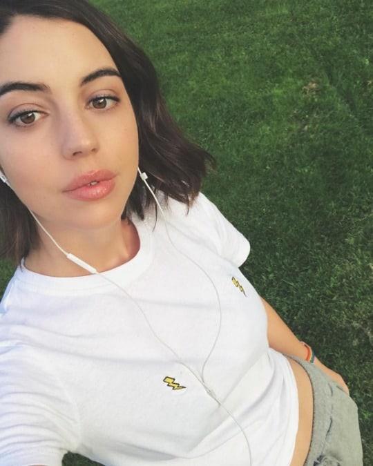 Adelaide Kane taking a selfie