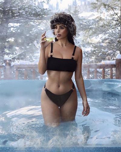 Nicole Isaacs in a bikini