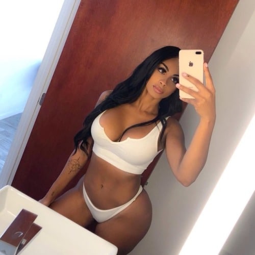 Ana Montana in a bikini taking a selfie