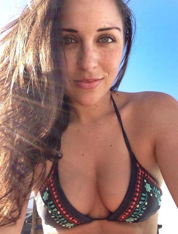 Elizabeth Barela in a bikini taking a selfie