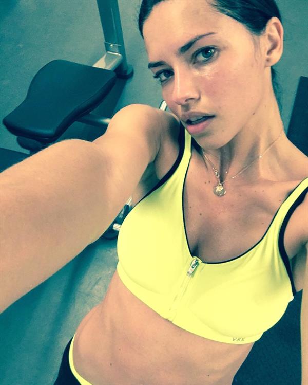 Adriana Lima taking a selfie