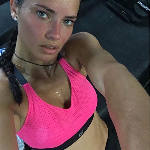 Adriana Lima taking a selfie