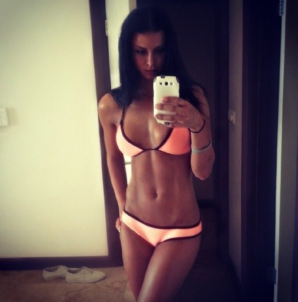 Anonymous in a bikini taking a selfie