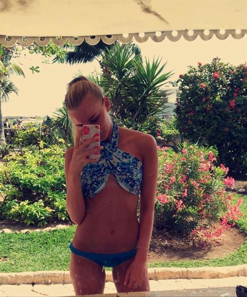 Anonymous in a bikini taking a selfie