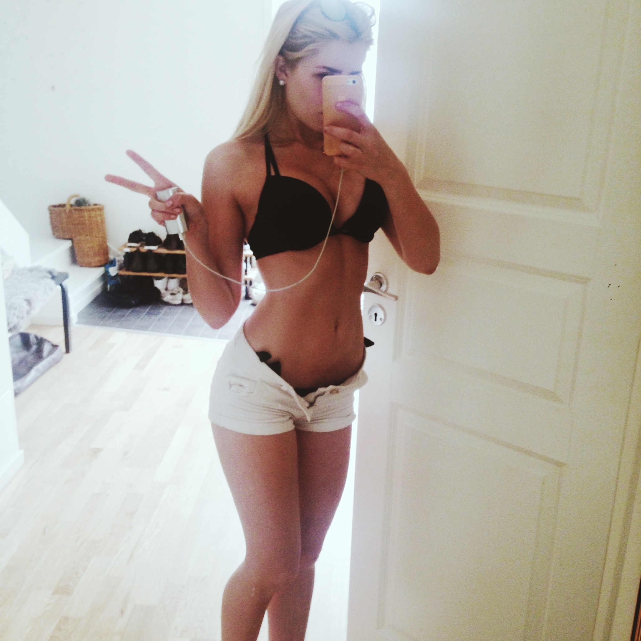 Anonymous in a bikini taking a selfie