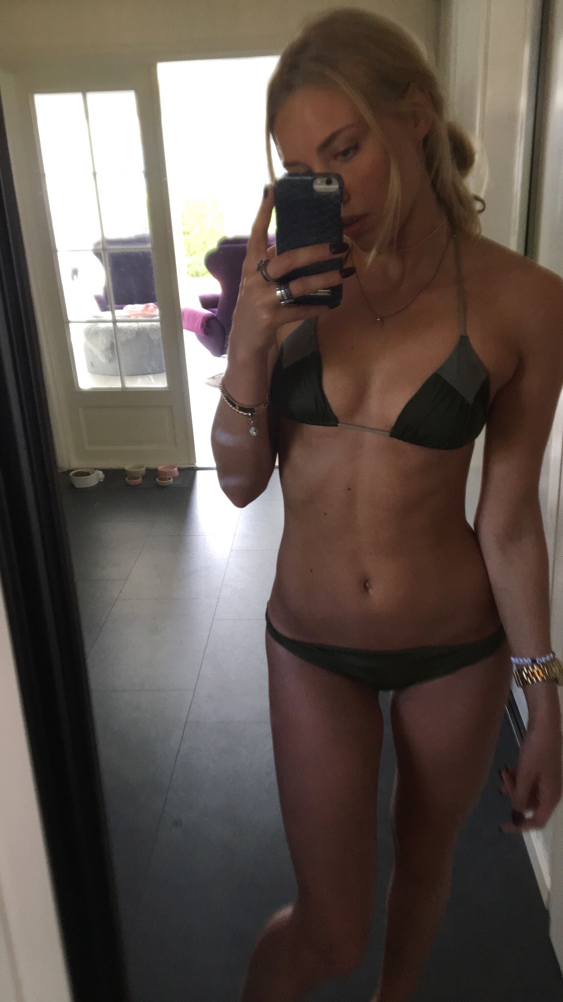 Anonymous in a bikini taking a selfie