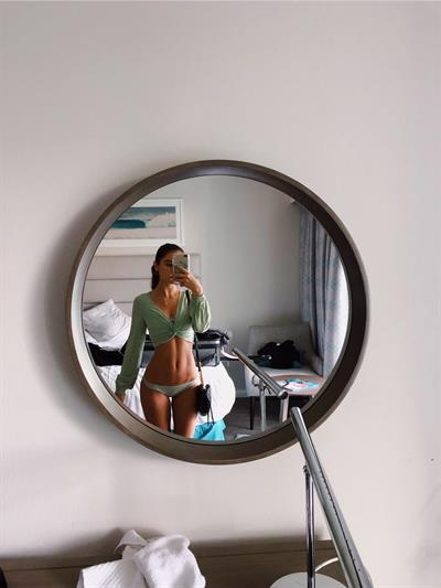 Anonymous in a bikini taking a selfie