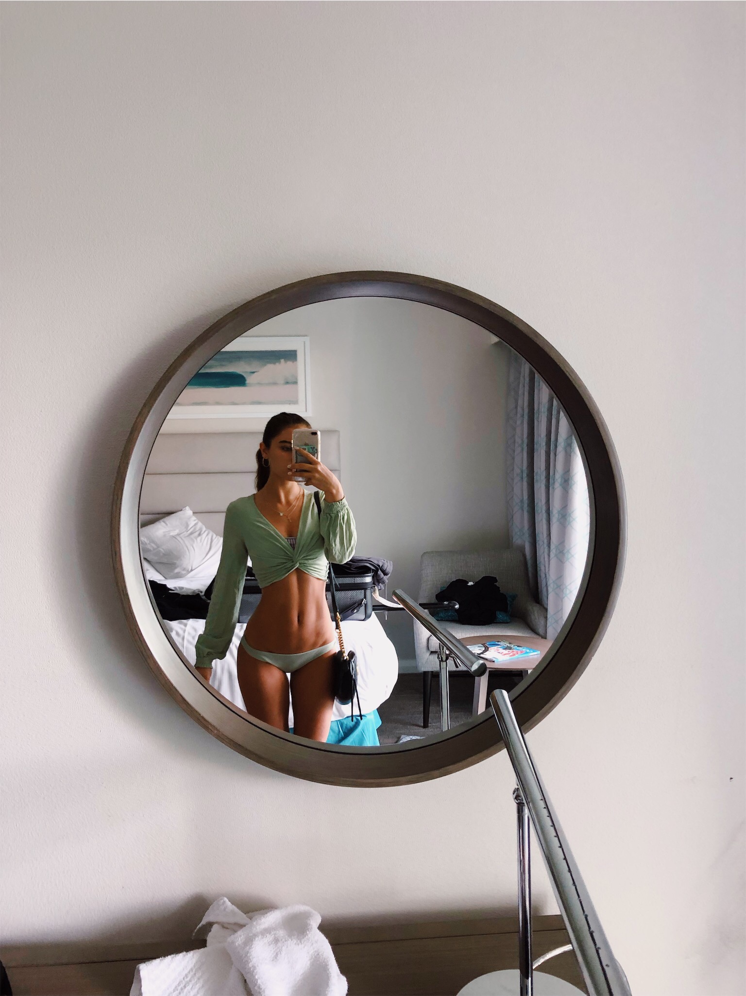 Anonymous in a bikini taking a selfie