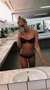 Anonymous in a bikini taking a selfie