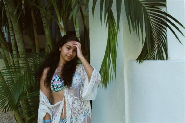 Alessia Cara sexy new photos in a bikini and other outfits.