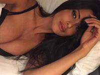 Eva Padlock in lingerie taking a selfie