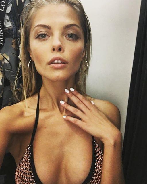 Alina Boyko in a bikini taking a selfie
