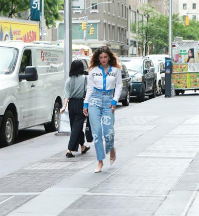 Bella Thorne braless tits seen by paparazzi showing her pierced nipple dressed all in Chanel.






