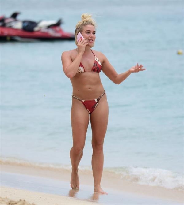 Gabby Allen sexy bikini photos seen by paparazzi on a beach in Barbados she has a nice ass.








