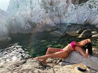 Nicole Scherzinger sexy bikini photos in Italy showing some nice cleavage and ass.


