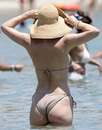 Katharine McPhee sexy bikini photos showing her boobs and ass seen by paparazzi.



