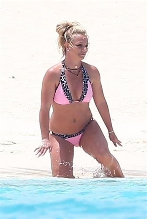 Britney Spears Bikini Pictures Britney Spears in a sexy bikini on the beach seen by paparazzi.