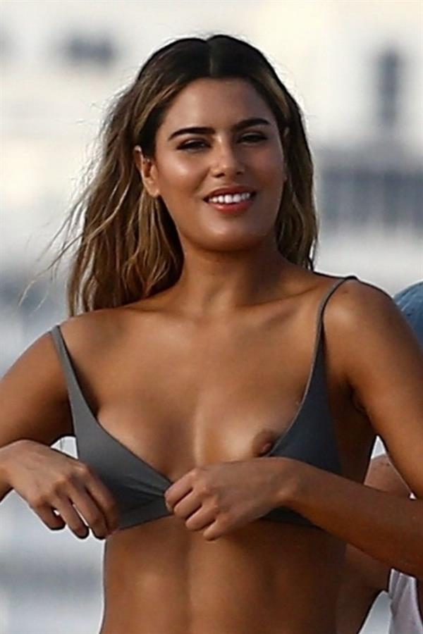 Ariadna Gutierrez caught nude by paparazzi during a bikini photo shoot changing bikinis showing her boobs and ass.












