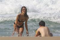 Alessandra Ambrosio sexy ass bikini body seen by paparazzi at the beach.

