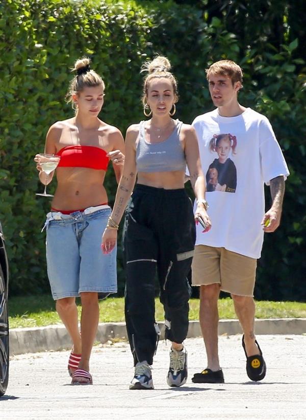Hailey Baldwin Bieber in a sexy red bikini out with Justin Bieber seen by paparazzi.




