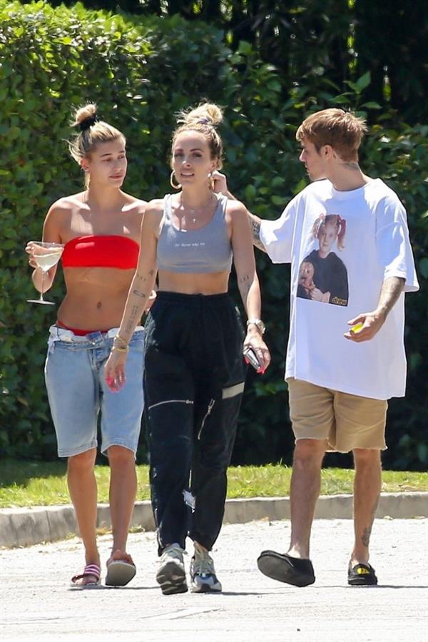 Hailey Baldwin Bieber in a sexy red bikini out with Justin Bieber seen by paparazzi.




