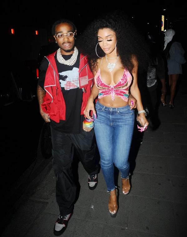 Saweetie sexy boobs showing nice cleavage seen by paparazzi with Quavo.












