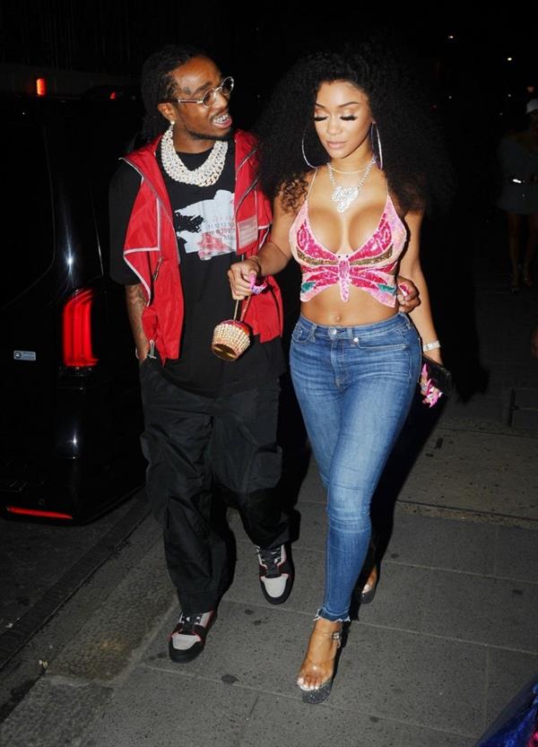 Saweetie sexy boobs showing nice cleavage seen by paparazzi with Quavo.












