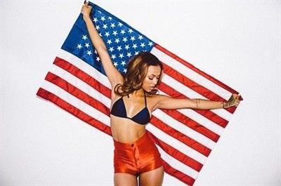 Karrueche Tran sexy in a bikini top showing some nice cleavage for the 4th of July.



