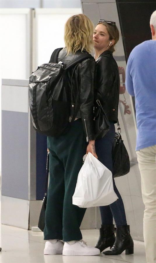 Cara Delevingne and Ashley Benson kissing at the airport.






















