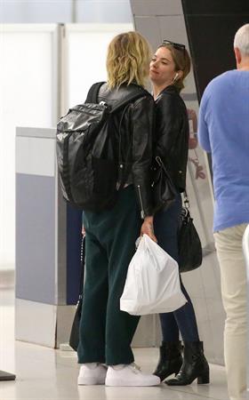 Cara Delevingne and Ashley Benson kissing at the airport.























