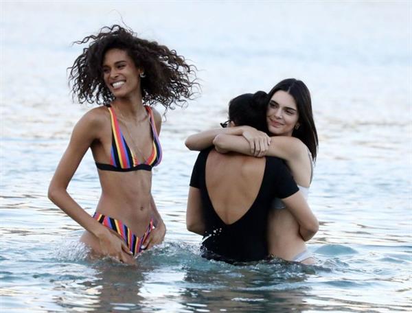 Kendall Jenner sexy ass in a thong bikini seen by paparazzi in the water at the beach.




























