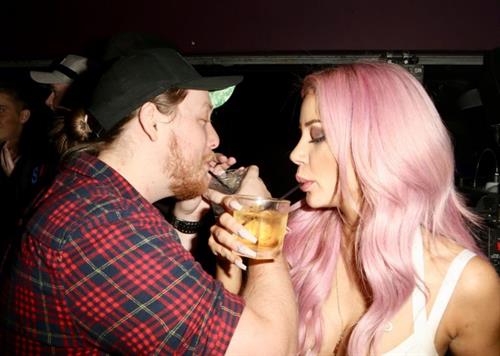 Jessika Power Pictures Jessika Power sexy lesbian kiss out partying in a white dress showing some nice cleavage.