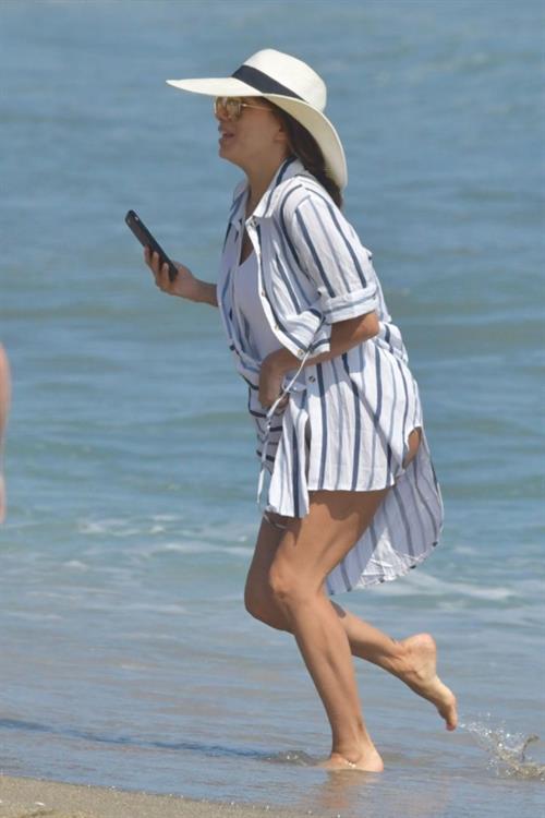 Eva Longoria Pictures Eva Longoria sexy ass in a swimsuit at the beach seen by paparazzi.