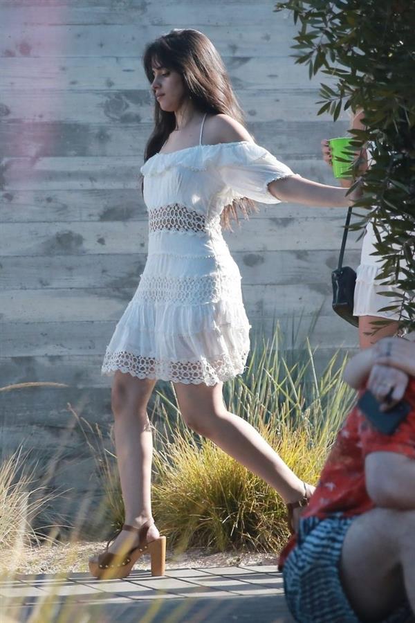 Camila Cabello sexy ass in a white dress seen with Shawn Mendes by paparazzi.


