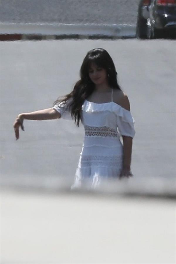 Camila Cabello sexy ass in a white dress seen with Shawn Mendes by paparazzi.


