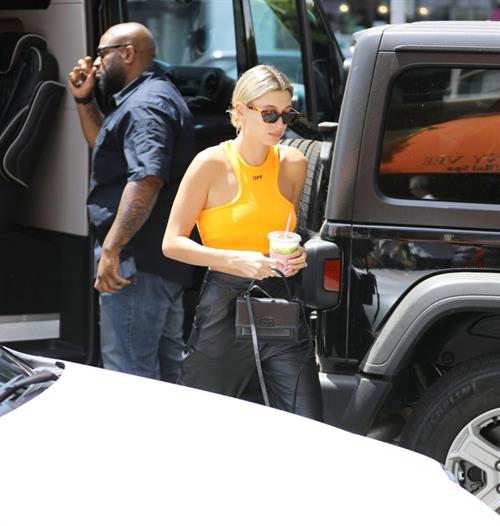 Hailey Bieber Pictures Hailey Bieber braless tits pokies seen by paparazzi in a halter top.