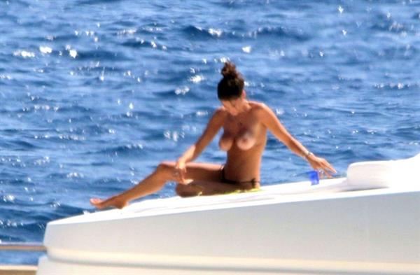 Francesca Sofia Novello caught topless by paparazzi tanning with her nude boobs exposed.
