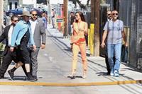 Alex Morgan braless and sexy in a orange jacket seen by paparazzi.








