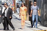 Alex Morgan braless and sexy in a orange jacket seen by paparazzi.








