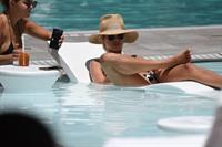 Natalie Roser in a sexy ass bikini by the pool seen by paparazzi.












