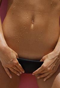 Marisa Papen nude and sexy photo shoot for playboy showing her pussy, boobs, and ass at the beach.

























