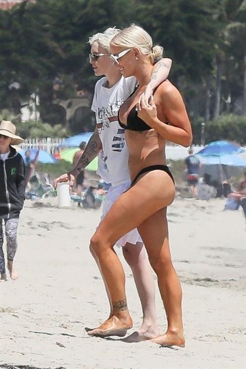 Gigi Gorgeous sexy cleavage in a bikini at the beach with Nats Getty seen by paparazzi.




