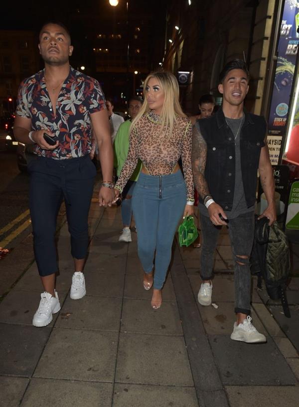 Chloe Ferry braless boobs in a see through top seen by paparazzi showing off her tits and ass.





