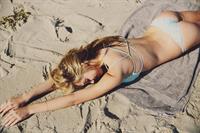 Alexis Ren in a bikini - ass